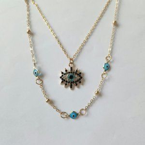 NWT Gold Tone, beaded, layered evil eye blue crystal pendant 20' to 22".